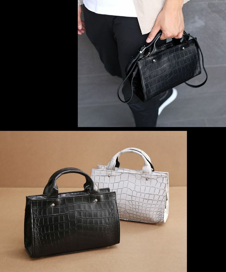 ショルダーベルト付きの鰐革鞄