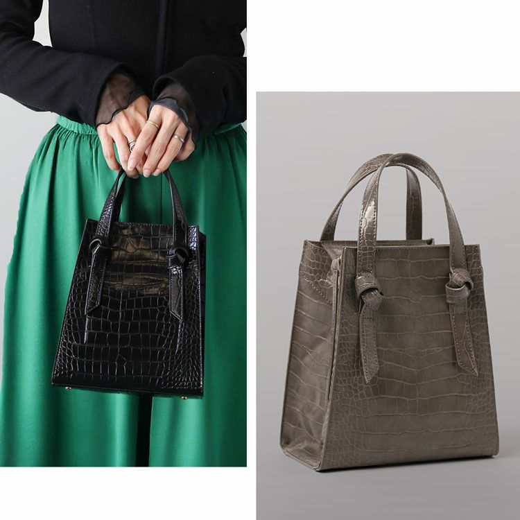 きれいめコーデやオケージョンにも使えるフェイクレザーハンドバッグ